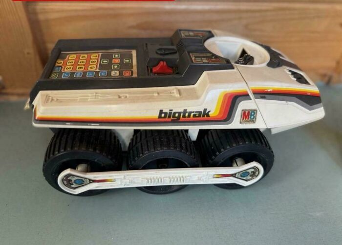 Vintage Bigtrak toy robot vehicle with retro design, evoking nostalgic memories and reminders of old age.