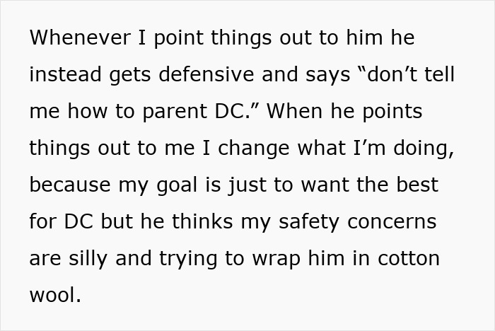 Husband carries infant by the arms and wipes face with dishrags, unaware of wife's concern about safety. Husband carries infant by the arms and wipes face with dishrags, unaware of wife's concern about safety.