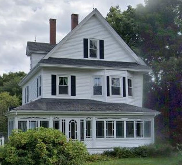 Large white house with black shutters surrounded by greenery, related to Coldplay HR exec mortgage news. Large white house with black shutters surrounded by greenery, related to Coldplay HR exec mortgage news.