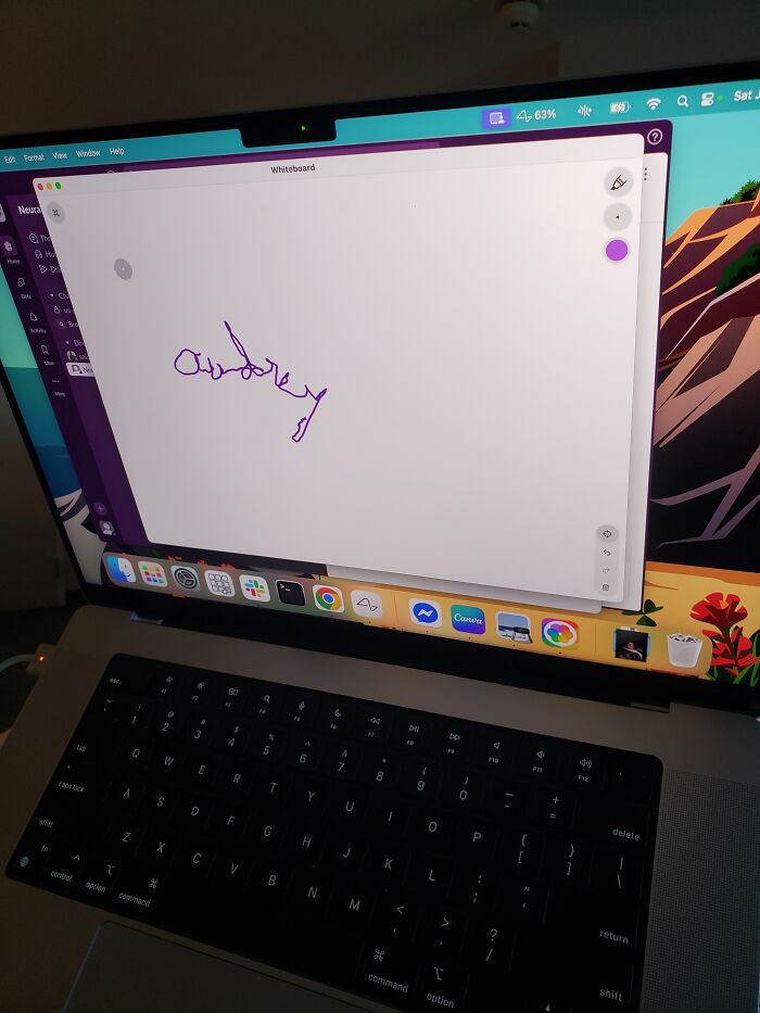 Laptop screen displaying digital handwriting on whiteboard, illustrating Elon Musk Neuralink brain chip technology in use. Laptop screen displaying digital handwriting on whiteboard, illustrating Elon Musk Neuralink brain chip technology in use.