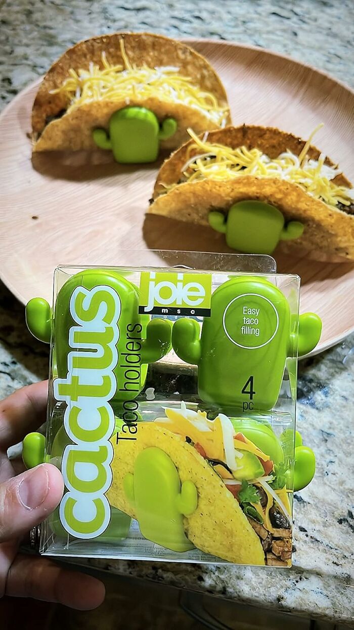 Green cactus taco holders from Joie with tacos on a plate, a brilliant kitchen item for counter space use.