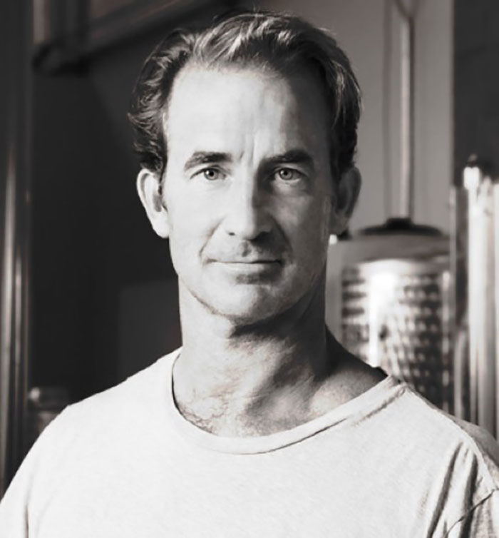 Black and white portrait of a man indoors, related to Coldplay HR exec mortgage news story. Black and white portrait of a man indoors, related to Coldplay HR exec mortgage news story.