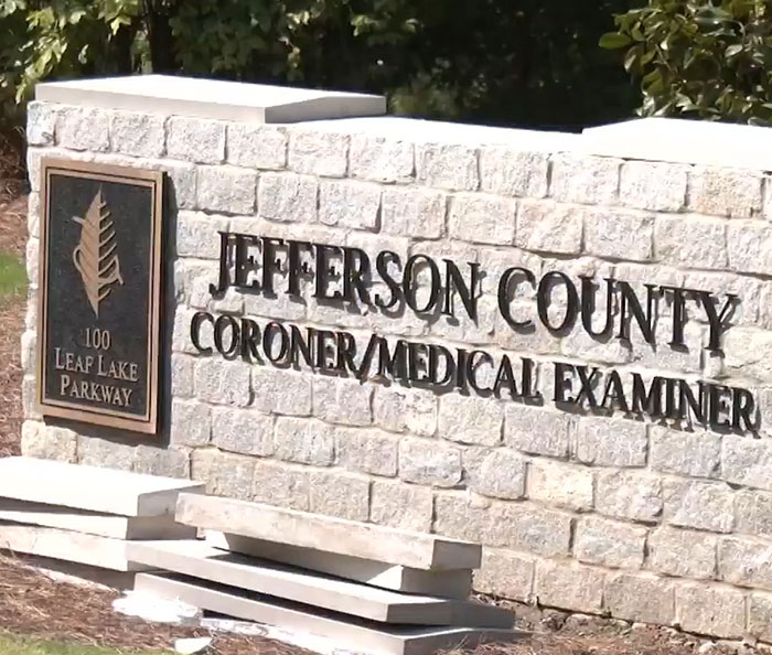 Sign outside the Jefferson County Coroner Medical Examiner office where investigation of 3-year-old boy in foster care is conducted Sign outside the Jefferson County Coroner Medical Examiner office where investigation of 3-year-old boy in foster care is conducted