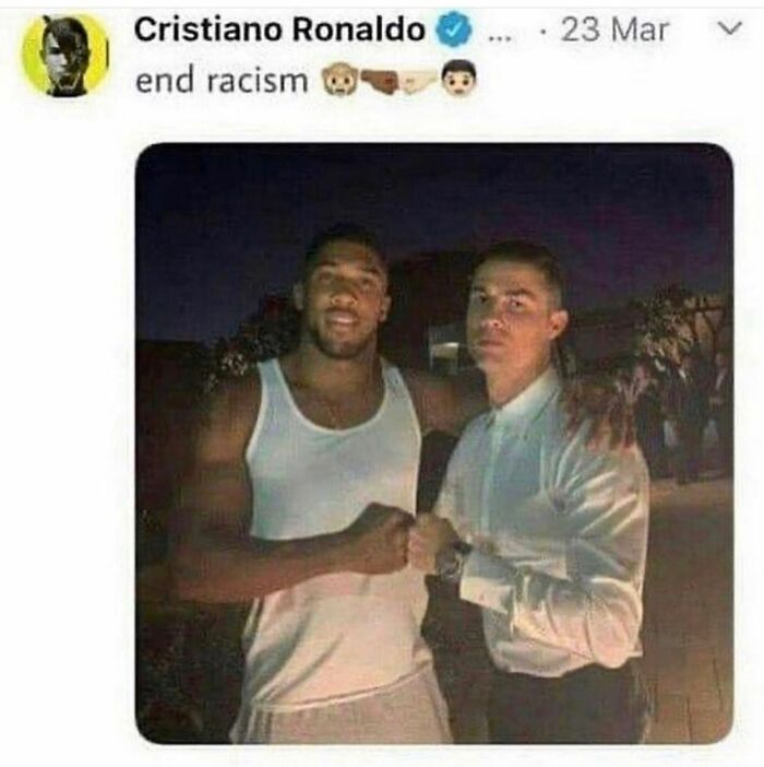 Screenshot of Cristiano Ronaldo tweet saying end racism with emoji, photo of two men fist bumping at night, weird and unhinged humor meme.