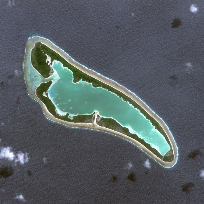 Satellite image of a remote island revealing a major clue in the Amelia Earhart mystery investigation. Satellite image of a remote island revealing a major clue in the Amelia Earhart mystery investigation.