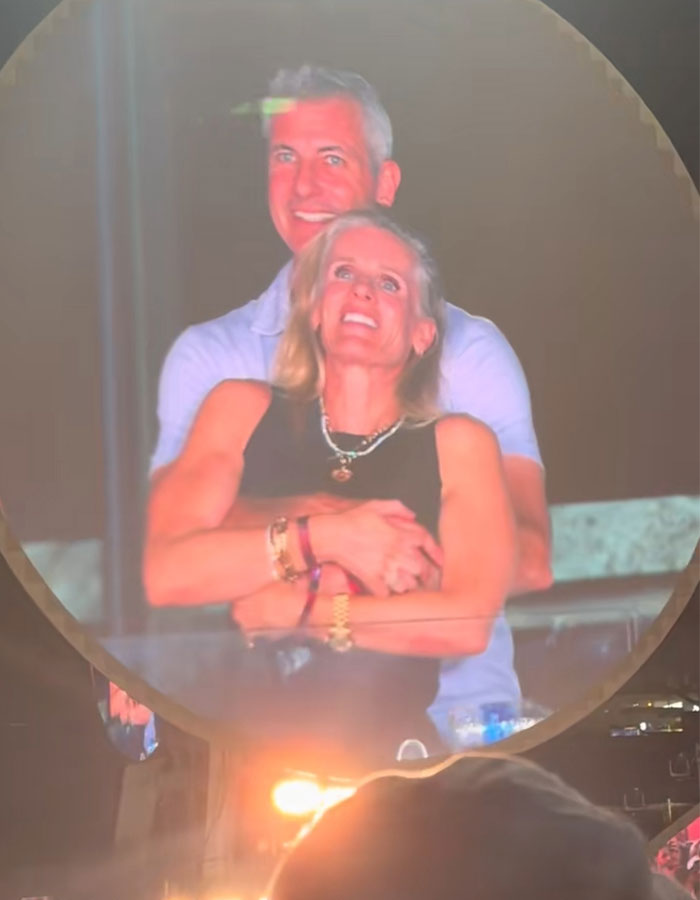 Couple featured on kiss cam at Coldplay concert, with Coldplay fan exposing cheating CEO through video capture. Couple featured on kiss cam at Coldplay concert, with Coldplay fan exposing cheating CEO through video capture.