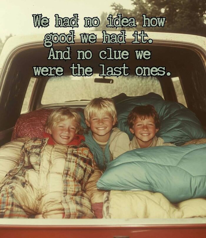 Three smiling kids in sleeping bags in a truck bed, evoking good old days memories from the '80s childhood.