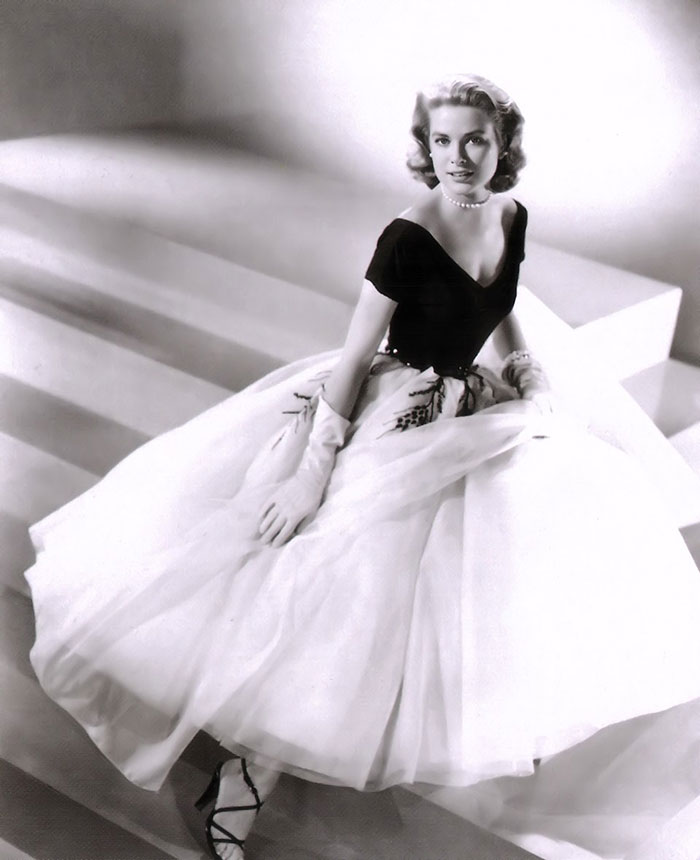 Grace Kelly in a classic glamorous black and white dress iconic of her legendary Hollywood style. Grace Kelly in a classic glamorous black and white dress iconic of her legendary Hollywood style.