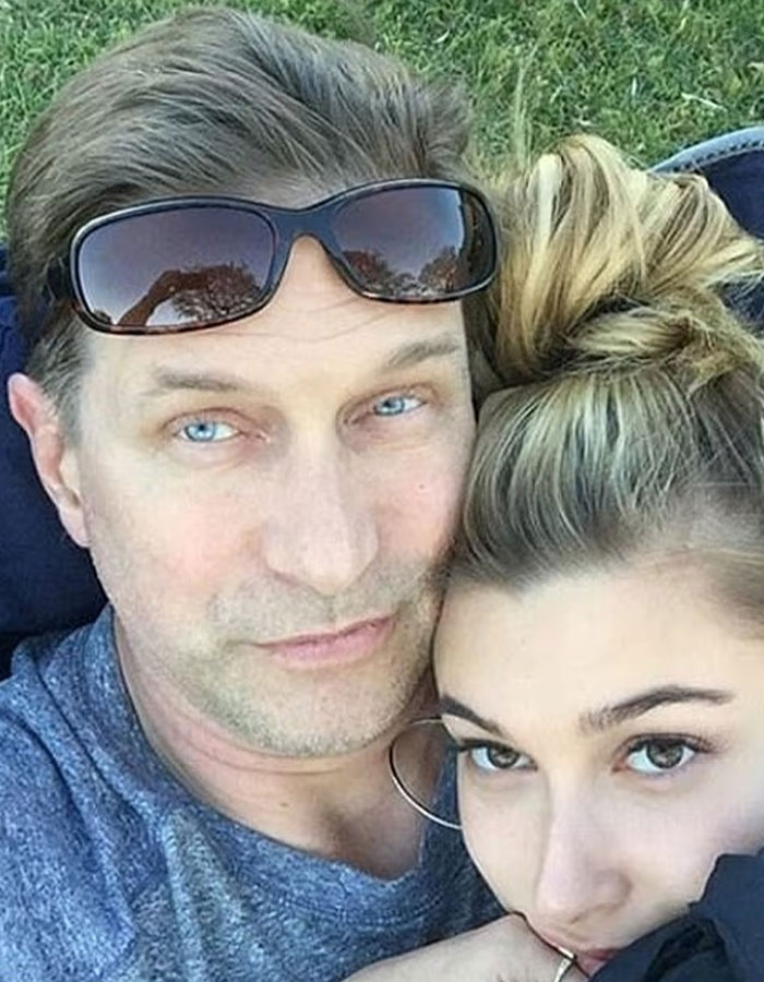 Stephen Baldwin and Hailey Bieber close together outdoors, capturing a personal family moment amid Rhode sale news. Stephen Baldwin and Hailey Bieber close together outdoors, capturing a personal family moment amid Rhode sale news.