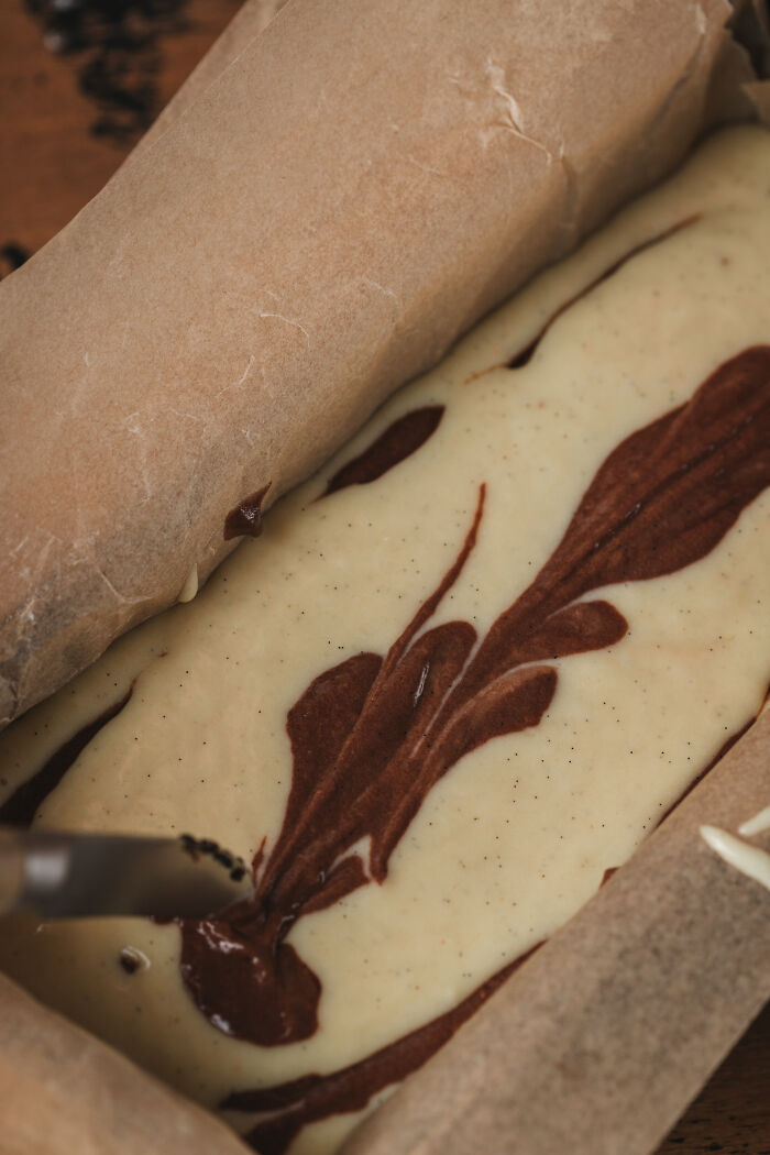 Baking a childhood cake with chocolate swirls in parchment paper as a family’s unexpected remedy after hospital trip. Baking a childhood cake with chocolate swirls in parchment paper as a family’s unexpected remedy after hospital trip.