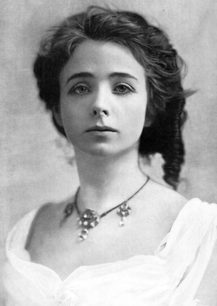Vintage portrait of a woman from century-old photos capturing timeless beauty and classic elegance in black and white.
