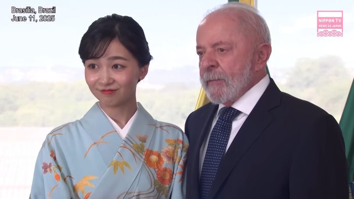 Japanese Princess Kako wearing a traditional kimono while standing next to a man in a suit at an event in Brasilia. Japanese Princess Kako wearing a traditional kimono while standing next to a man in a suit at an event in Brasilia.