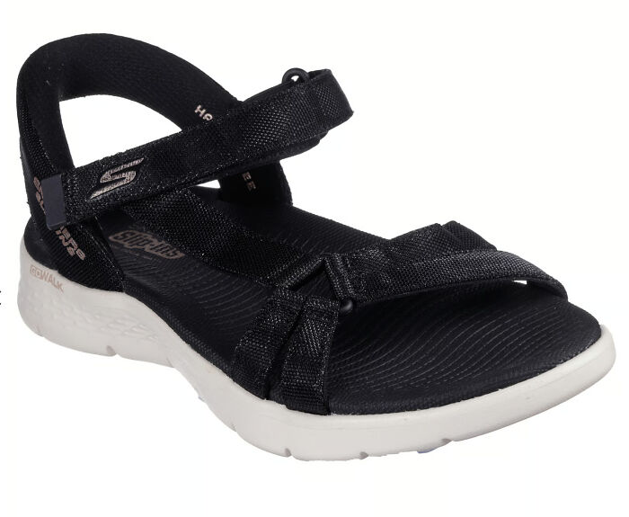 Black comfortable sandal with adjustable straps and white sole, perfect for stylish sandal season in Europe.
