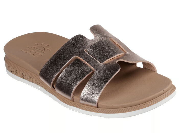 Brown and metallic leather slide sandal with cushioned sole, perfect for stylish and comfortable sandal season in Europe.