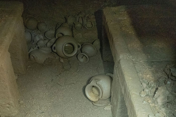 Ancient burial chamber inside 2,600-year-old tomb in Italy with pottery vessels uncovered by archaeologists. Ancient burial chamber inside 2,600-year-old tomb in Italy with pottery vessels uncovered by archaeologists.