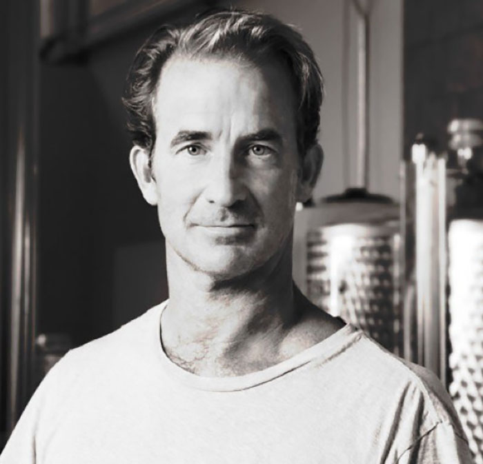 HR executive involved in Coldplay cheating scandal, photographed in a casual setting with soft lighting and a neutral background. HR executive involved in Coldplay cheating scandal, photographed in a casual setting with soft lighting and a neutral background.