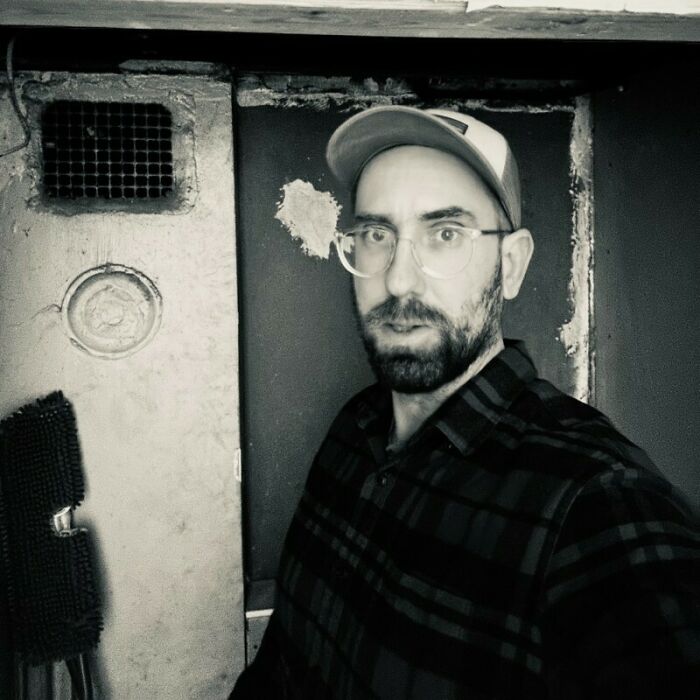 Interim CEO of Astronomer in a cap and glasses responding to Coldplay kiss cam controversy after leadership change. Interim CEO of Astronomer in a cap and glasses responding to Coldplay kiss cam controversy after leadership change.