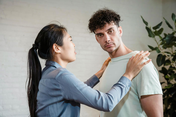 Couple having a serious conversation as woman discusses asking husband to turn down dream job career opportunity. Couple having a serious conversation as woman discusses asking husband to turn down dream job career opportunity.