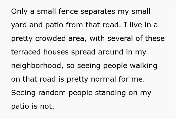 Small fence separating patio from road in crowded neighborhood, with people walking nearby, highlighting a man's autism experience. Small fence separating patio from road in crowded neighborhood, with people walking nearby, highlighting a man's autism experience.