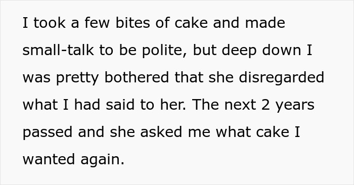 Annoyed worker looking at a birthday cake with a displeased expression during an office celebration. Annoyed worker looking at a birthday cake with a displeased expression during an office celebration.