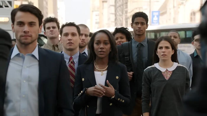 A diverse group of people walking outside, representing fans of the best Netflix shows that keep viewers coming back.