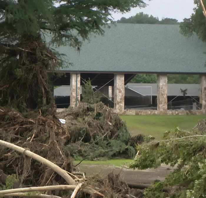 Flood-stricken Camp Mystic with debris and damaged trees after official sparks outrage over whites-only remarks. Flood-stricken Camp Mystic with debris and damaged trees after official sparks outrage over whites-only remarks.