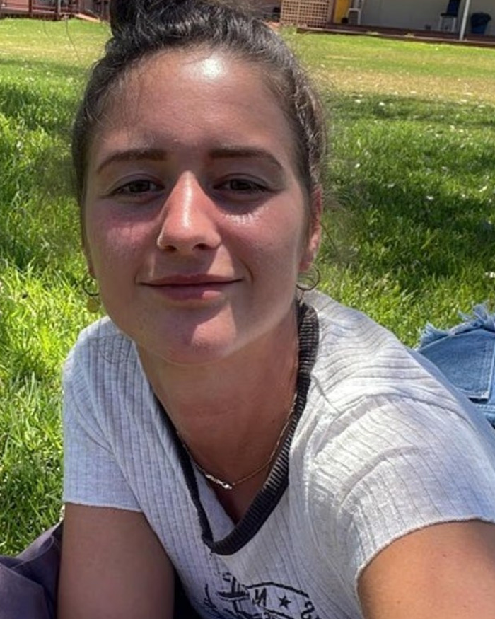 Young woman outdoors on grass, representing a backpacker who went missing in the Australian outback and was later found. Young woman outdoors on grass, representing a backpacker who went missing in the Australian outback and was later found.