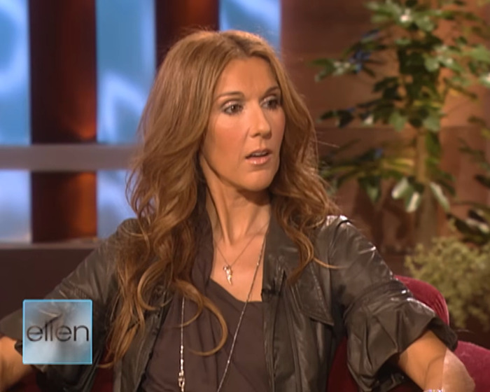 Céline Dion appearing surprised during a televised interview on the Ellen DeGeneres show set with plants in the background Céline Dion appearing surprised during a televised interview on the Ellen DeGeneres show set with plants in the background