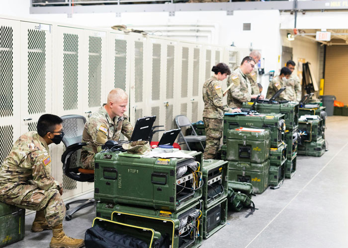 Soldiers inspecting and tracking military equipment in storage, addressing missing inventory issues over several months. Soldiers inspecting and tracking military equipment in storage, addressing missing inventory issues over several months.