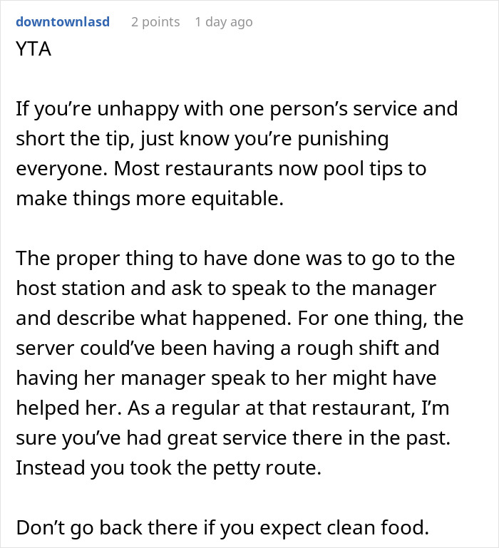 Screenshot of an online comment discussing tipping etiquette and consequences of taking back a tip after service issues. Screenshot of an online comment discussing tipping etiquette and consequences of taking back a tip after service issues.