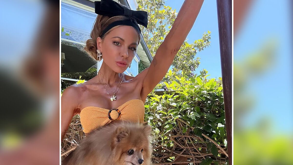 Kate Beckinsale outdoors with dog, showing drastic weight loss and a thin look, raising concern about Ozempic use.