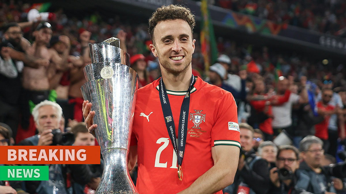 Football star Diogo Jota wearing Portugal jersey, holding trophy, celebrating UEFA Nations League victory with crowd in background.