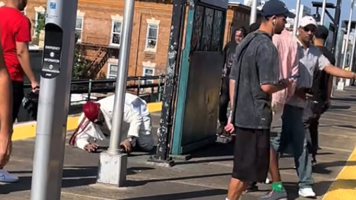 Group of men delivering vigilante justice on subway platform after brute attacked woman in a viral video incident.