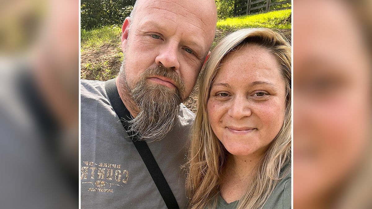 Photo of a man and woman outdoors, representing parents related to a tragic family incident involving a young girl.