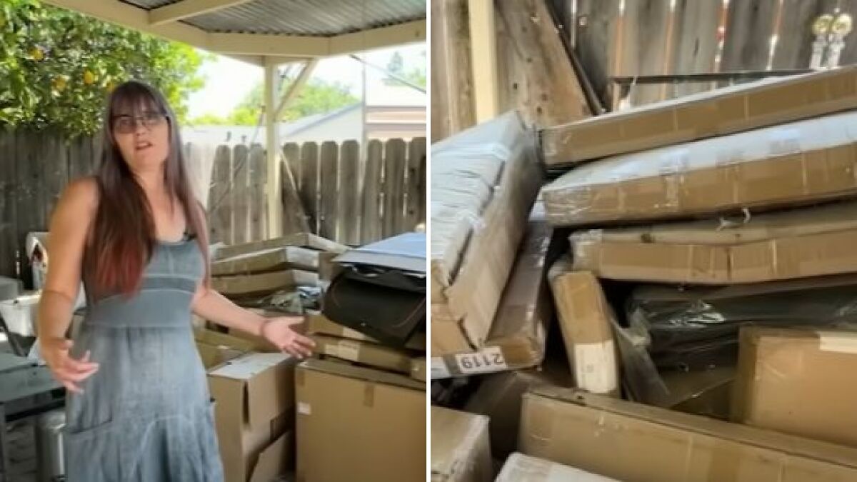 Woman standing by dozens of mistakenly delivered Amazon packages stacked outside her home over a year.