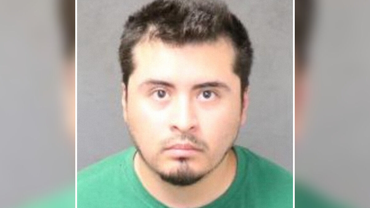 Mugshot of a man involved in a horrifying scene after he slays his entire family and dog before getting caught.