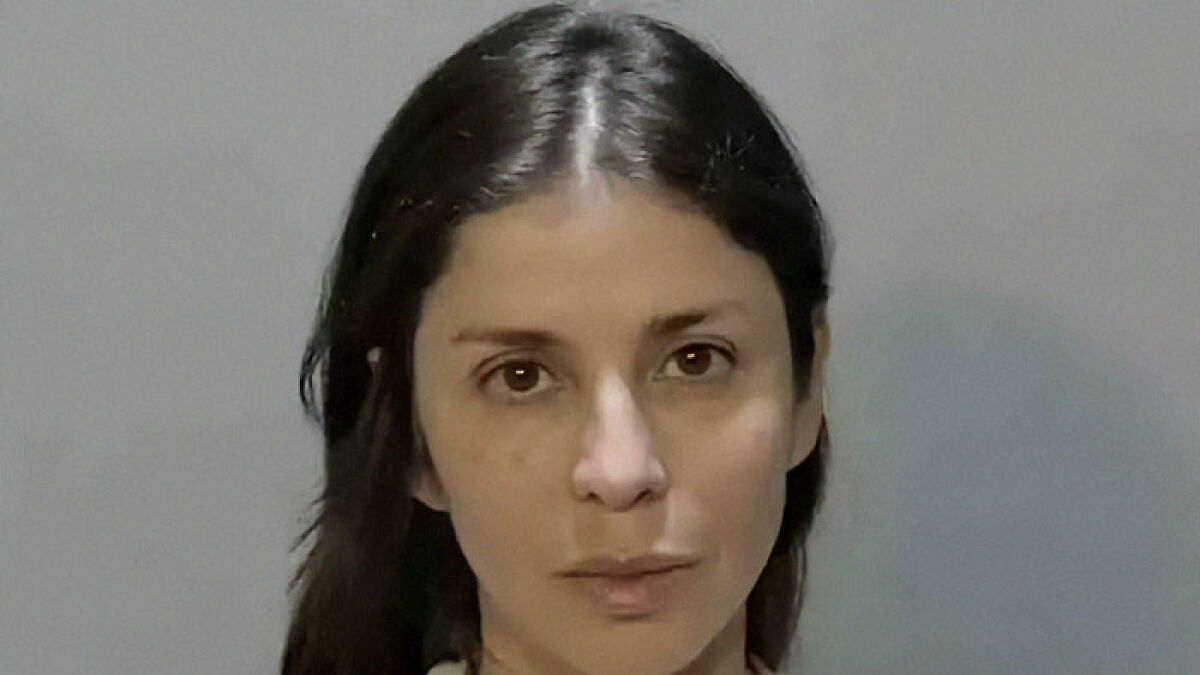 Florida woman with serious expression, involved in incident attacking driver over chicken being run over.