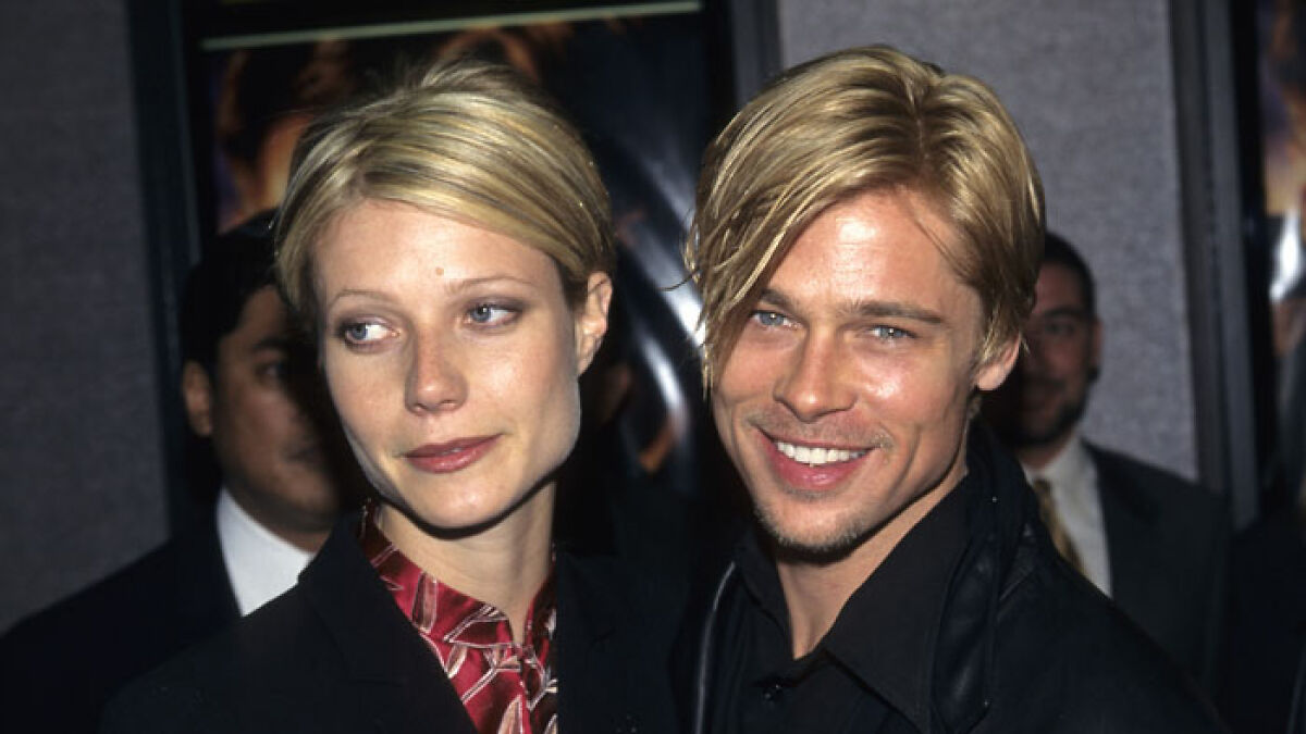 Gwyneth Paltrow and Brad Pitt smiling at a public event, highlighting Gwyneth Paltrow Brad Pitt relationship news.