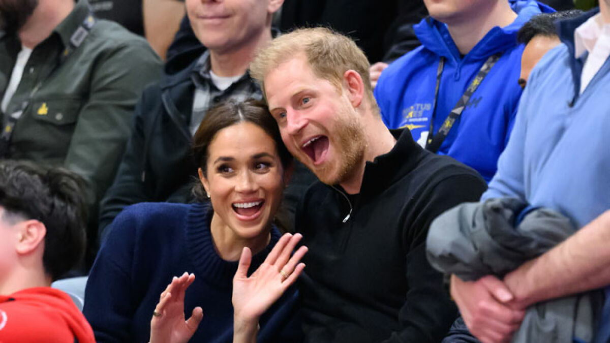 Meghan Markle and Prince Harry smiling and interacting with crowd at an event, featured in Family Guy trolling scene.