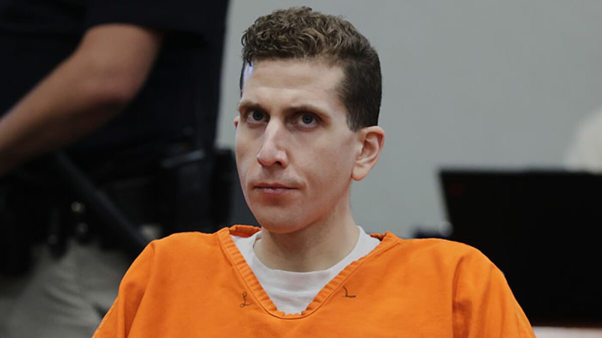 Bryan Kohberger wearing an orange prison jumpsuit in court as unsealed docs reveal gruesome crime details after sentencing.