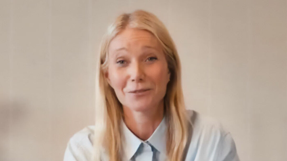 Gwyneth Paltrow speaking in a casual setting, addressing Coldplay frontman cheating rumors and viral astronomer drama.