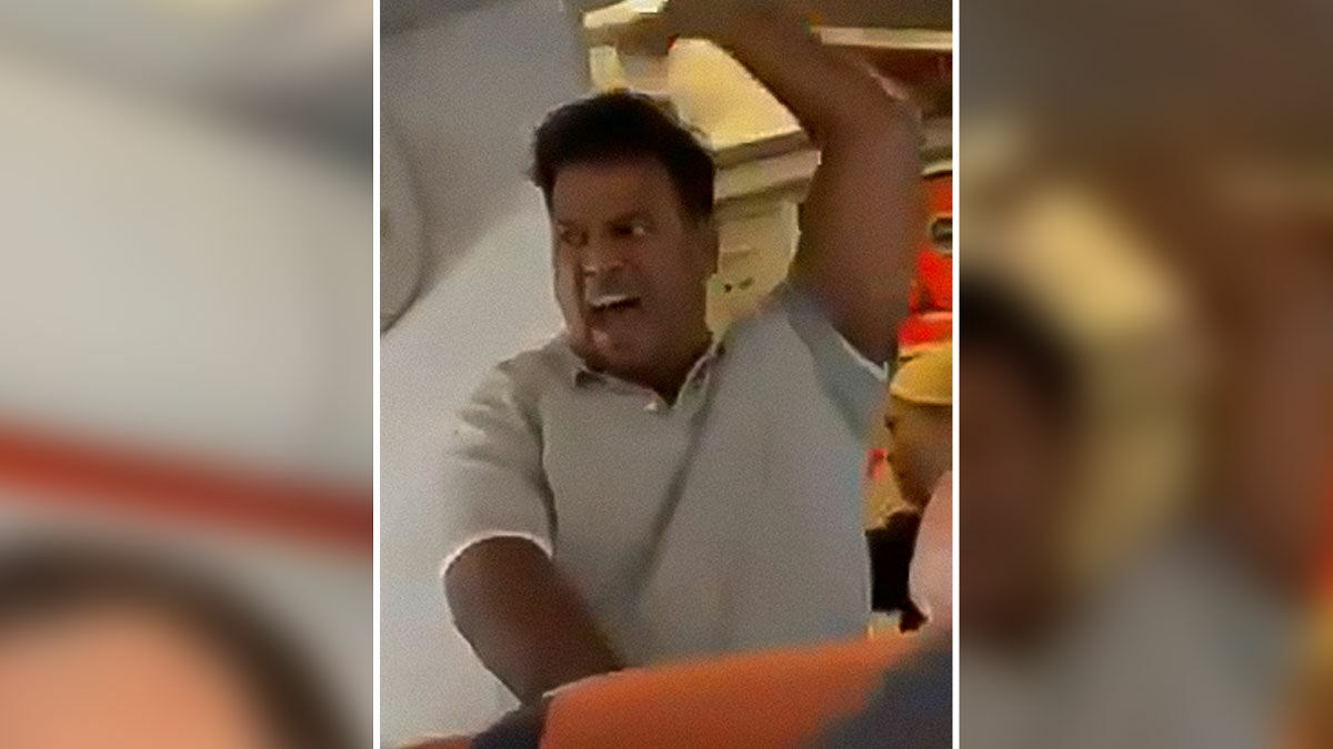Man threatening to explode plane mid-flight captured in a tense moment as passengers prepare to tackle him on board.