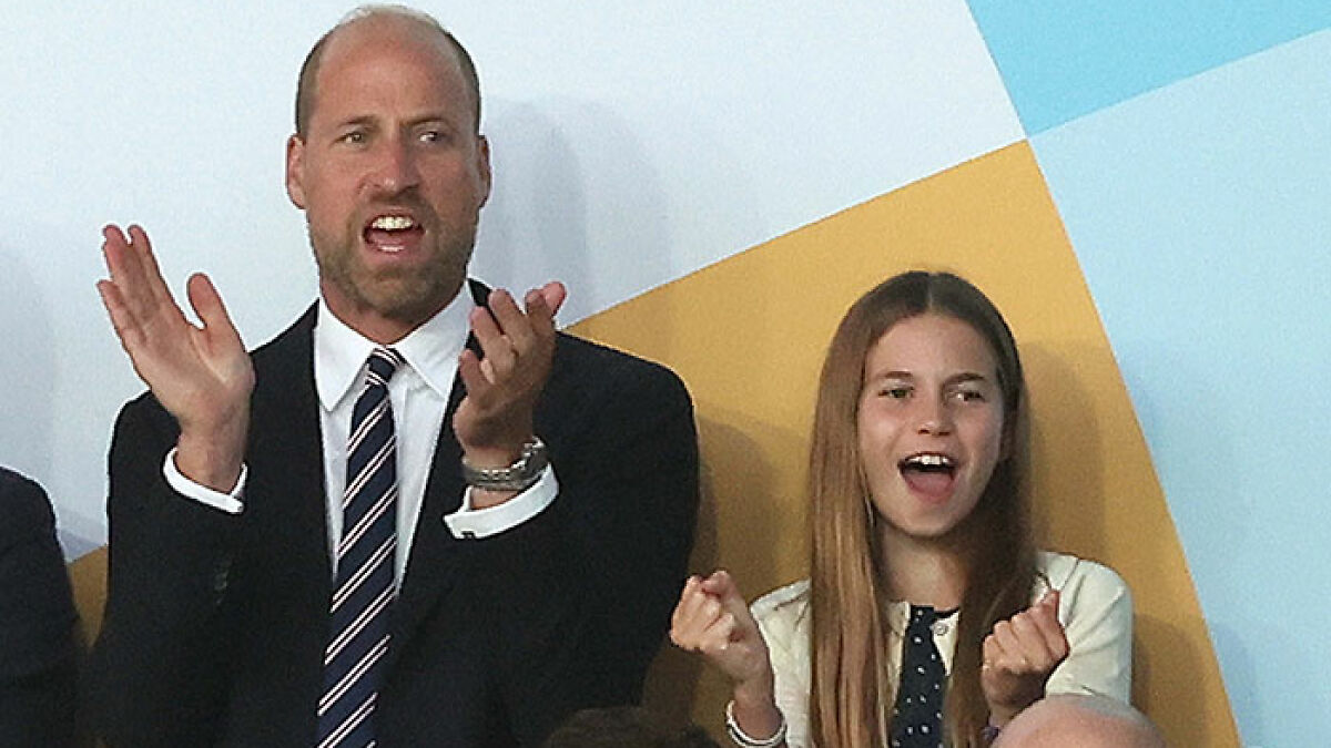 Princess Charlotte reacting excitedly while watching England's dramatic shootout win against Spain in a sports event.