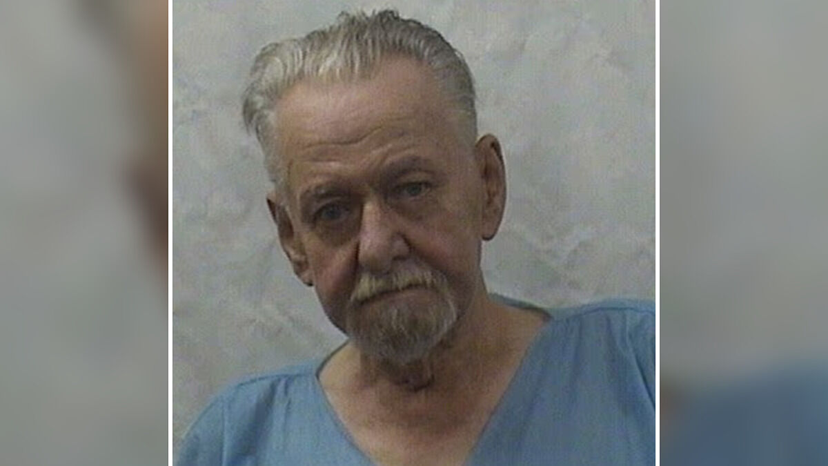 Older man in blue shirt with gray hair and beard, involved in wedding horror and e*******n-style shooting incident.