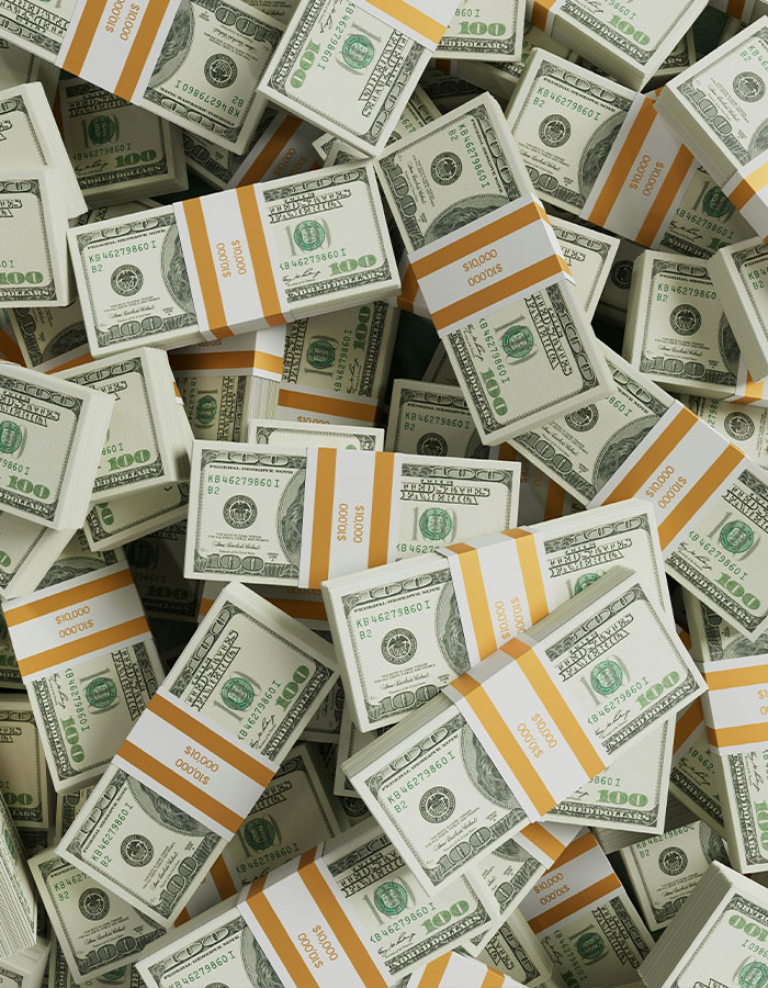 Stacks of hundred-dollar bills bundled in $10,000 increments symbolizing earnings of an OnlyFans star funded by parents Stacks of hundred-dollar bills bundled in $10,000 increments symbolizing earnings of an OnlyFans star funded by parents