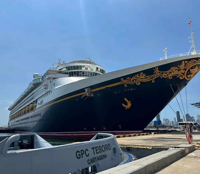 Large cruise ship docked at port with a small boat in foreground, related to police breaking silence on viral rumor. Large cruise ship docked at port with a small boat in foreground, related to police breaking silence on viral rumor.