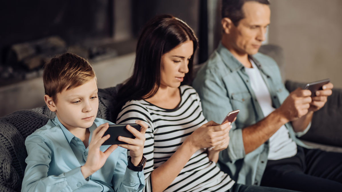 Family showing entitled behavior, focused on phones, highlighting hunger and consequences of being banned at home.