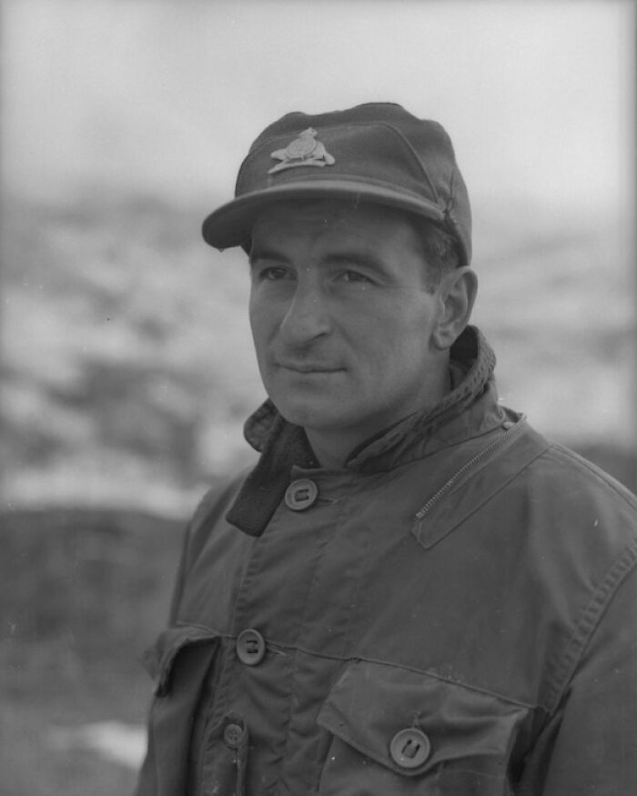 Black and white portrait of a man in outdoor clothing, representing crazy but real historical events in history.