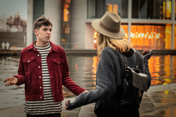 Young woman revisits past breakup, confronting a friend who reveals she was the other woman all along near waterfront.