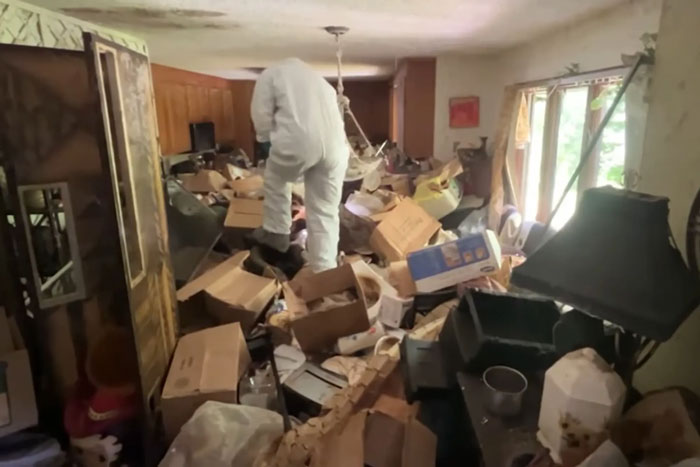 Police investigating skeletal remains found buried under trash in hoarder ex-cop's cluttered house of horrors. Police investigating skeletal remains found buried under trash in hoarder ex-cop's cluttered house of horrors.